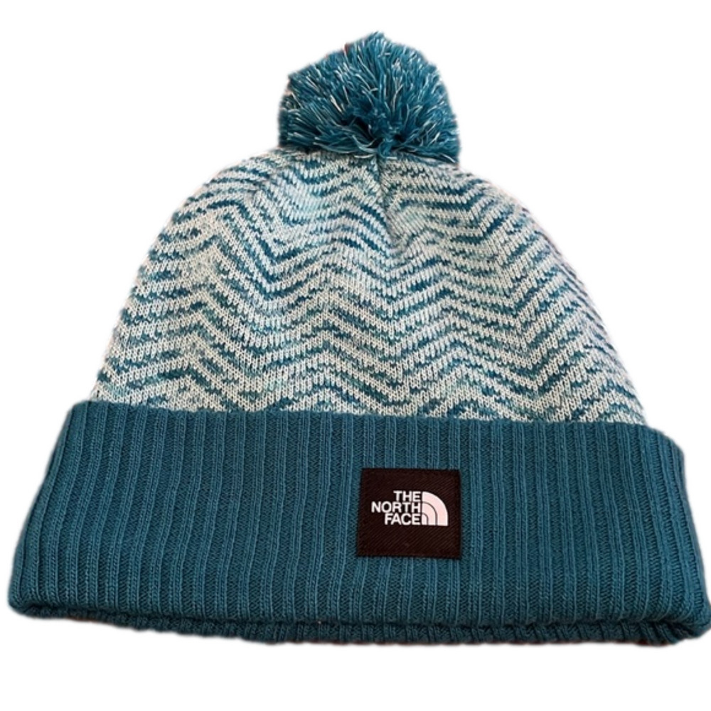 The North Face Kids snow hat, turquoise color, fleece lined. NWTS